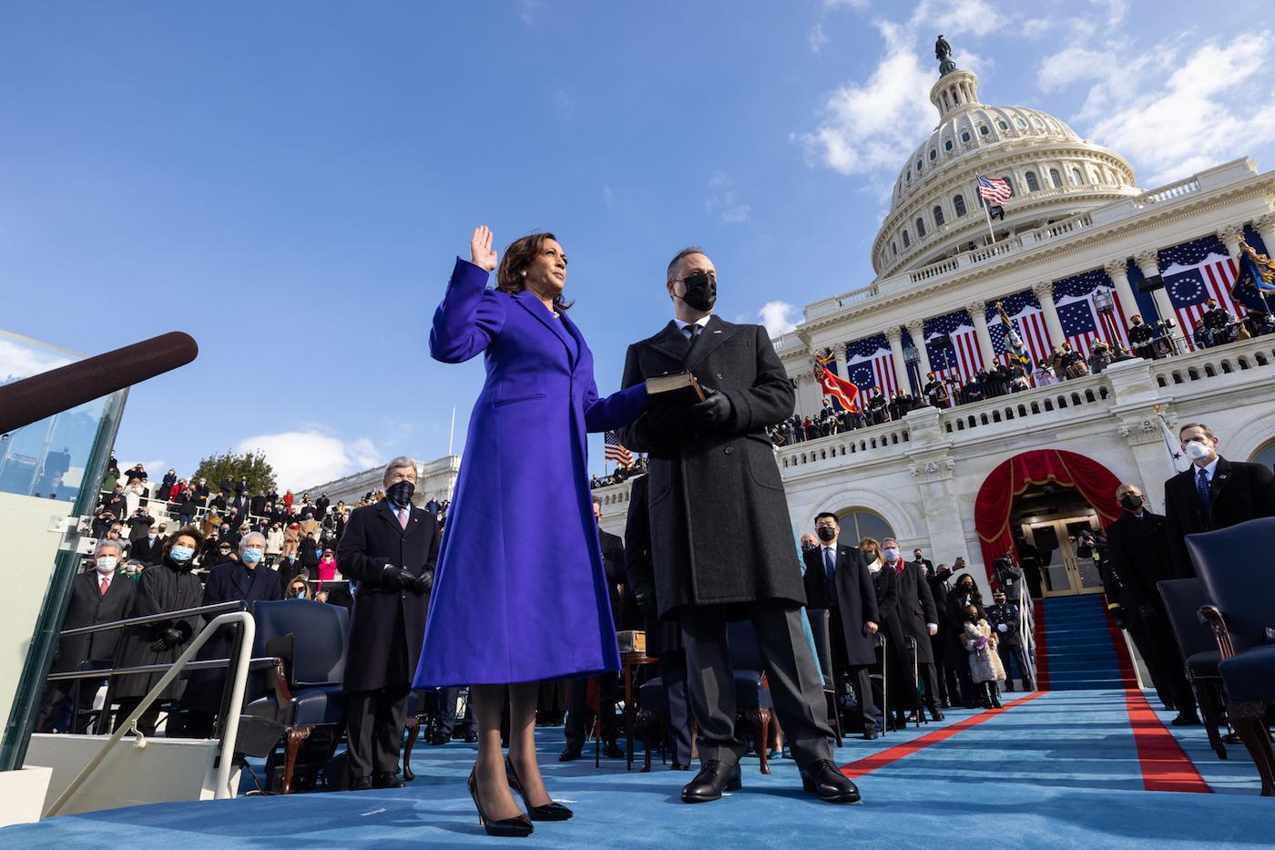 President Joe Biden looks on as Vice President Kamala Harris