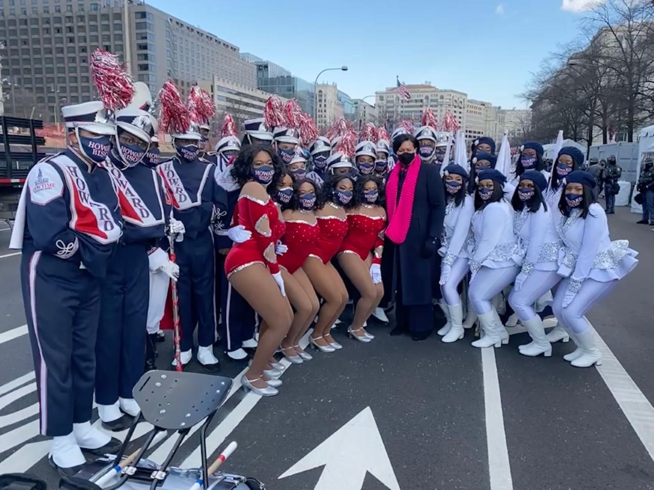 Howard Band standing with VP Harris