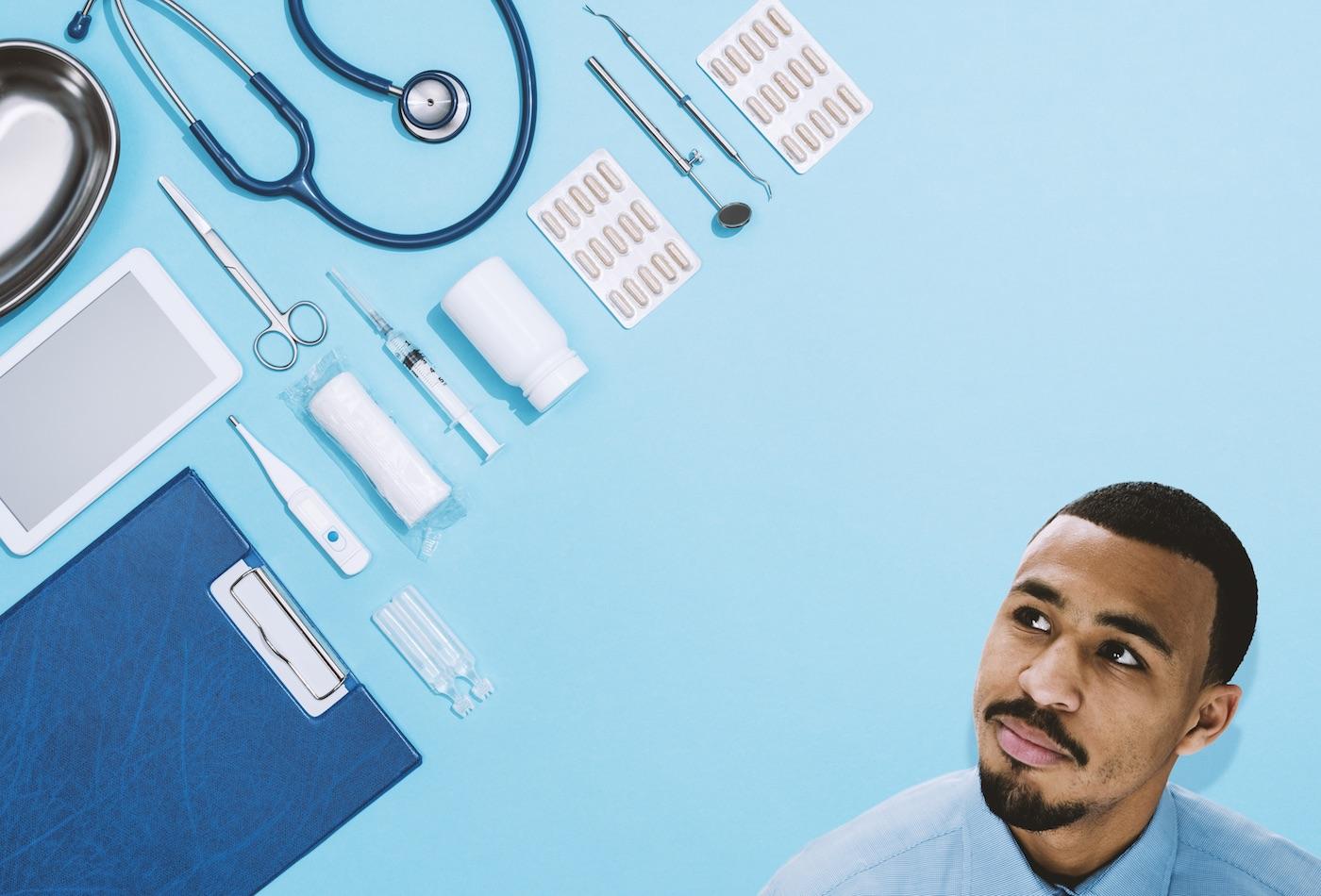 medical instruments laying on a blue background