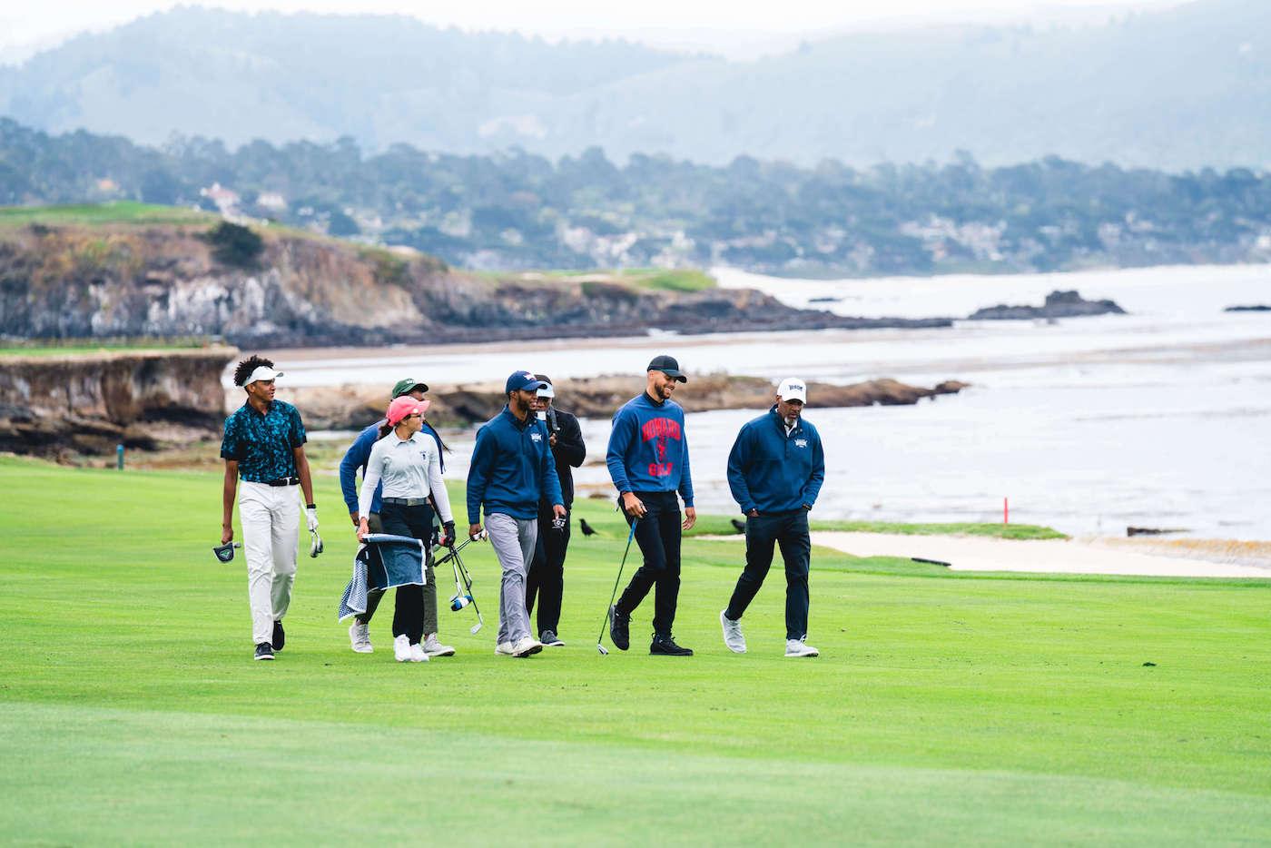 Howard Golf team walking along a coastal golf course
