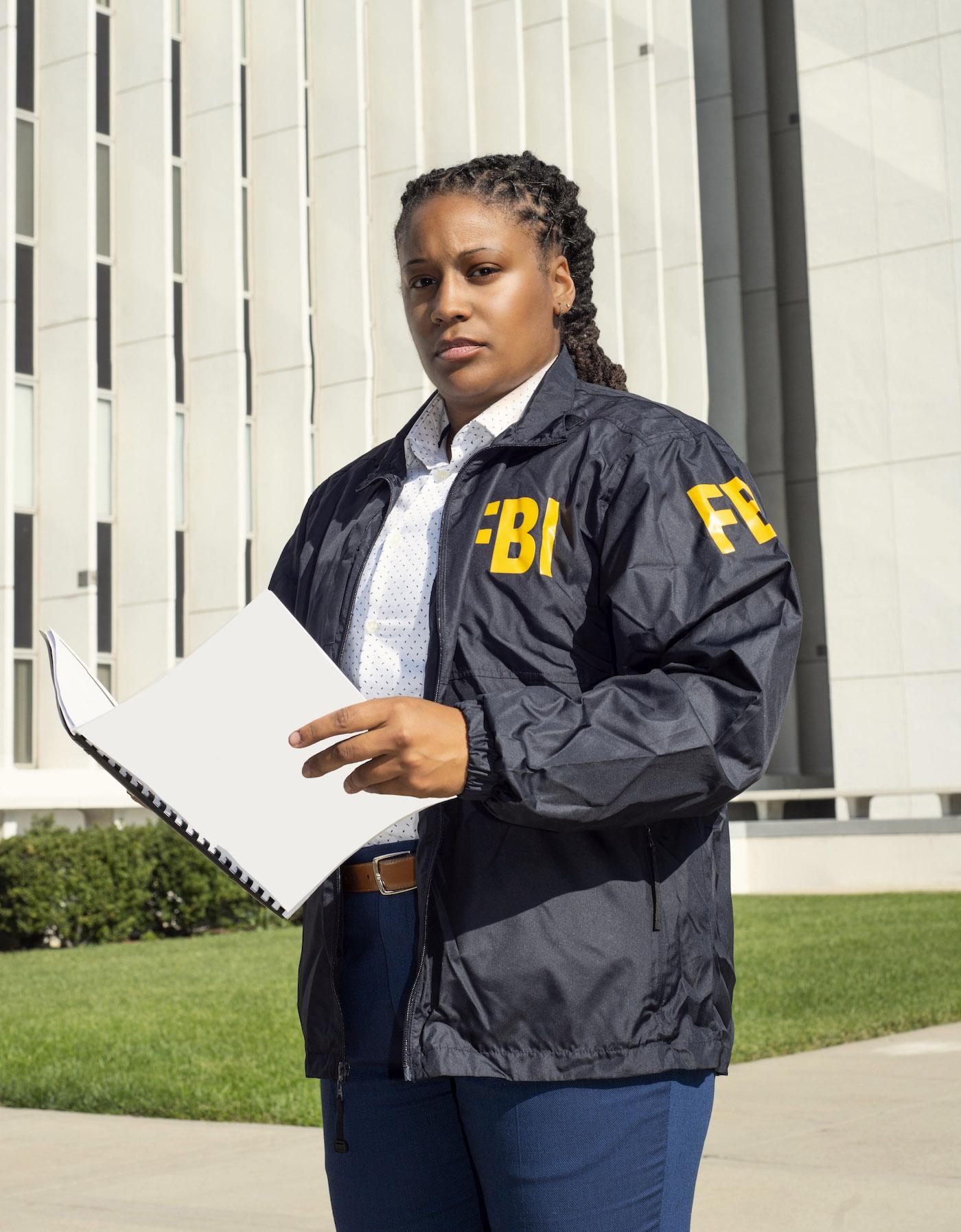 Ashley Marshall in FBI jacket 