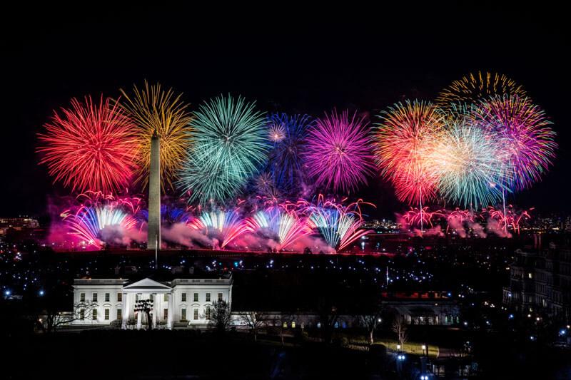Colorful fireworks going off above the White House