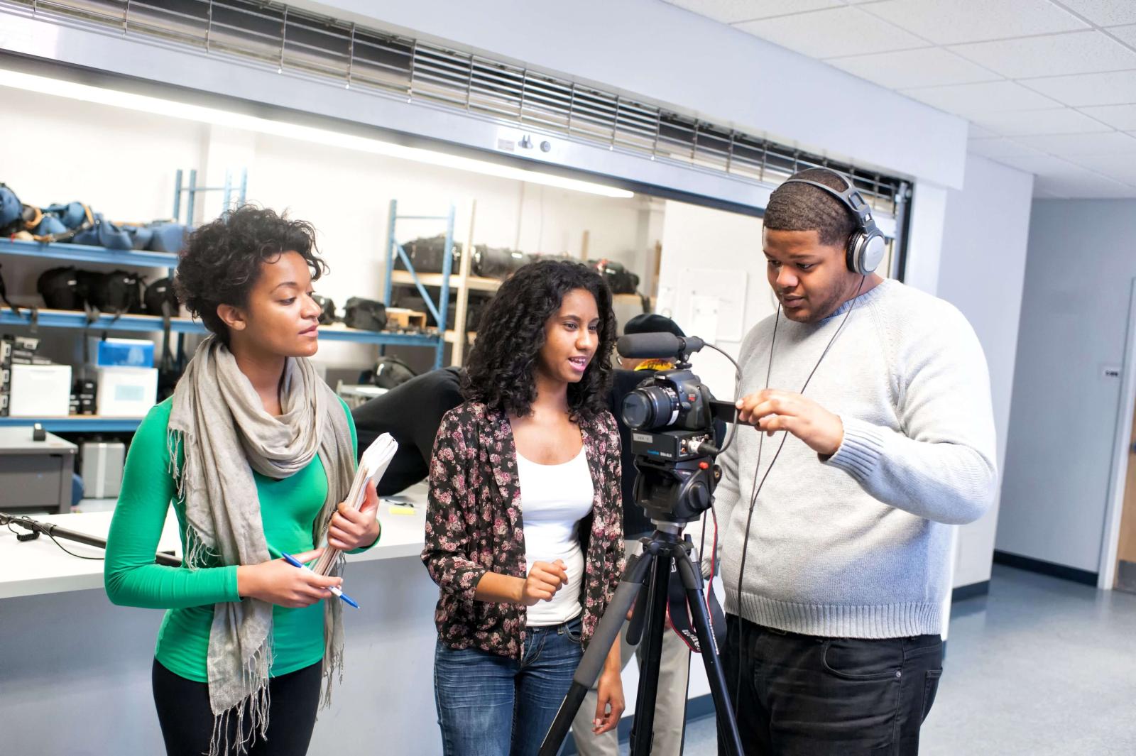 Howard students using camera equipment 