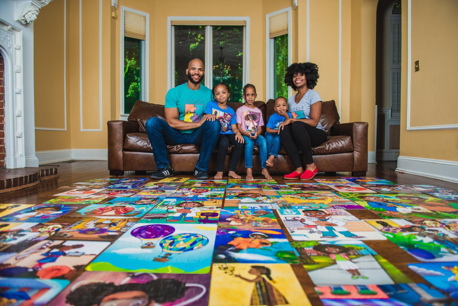 Matthew Goins and family with puzzles