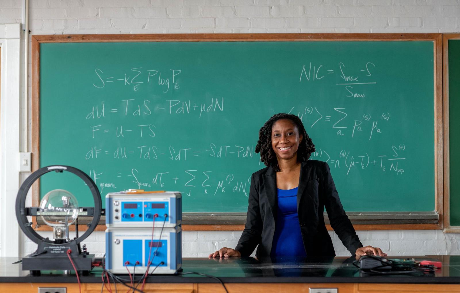 Kenisha Ford in front of blackboard