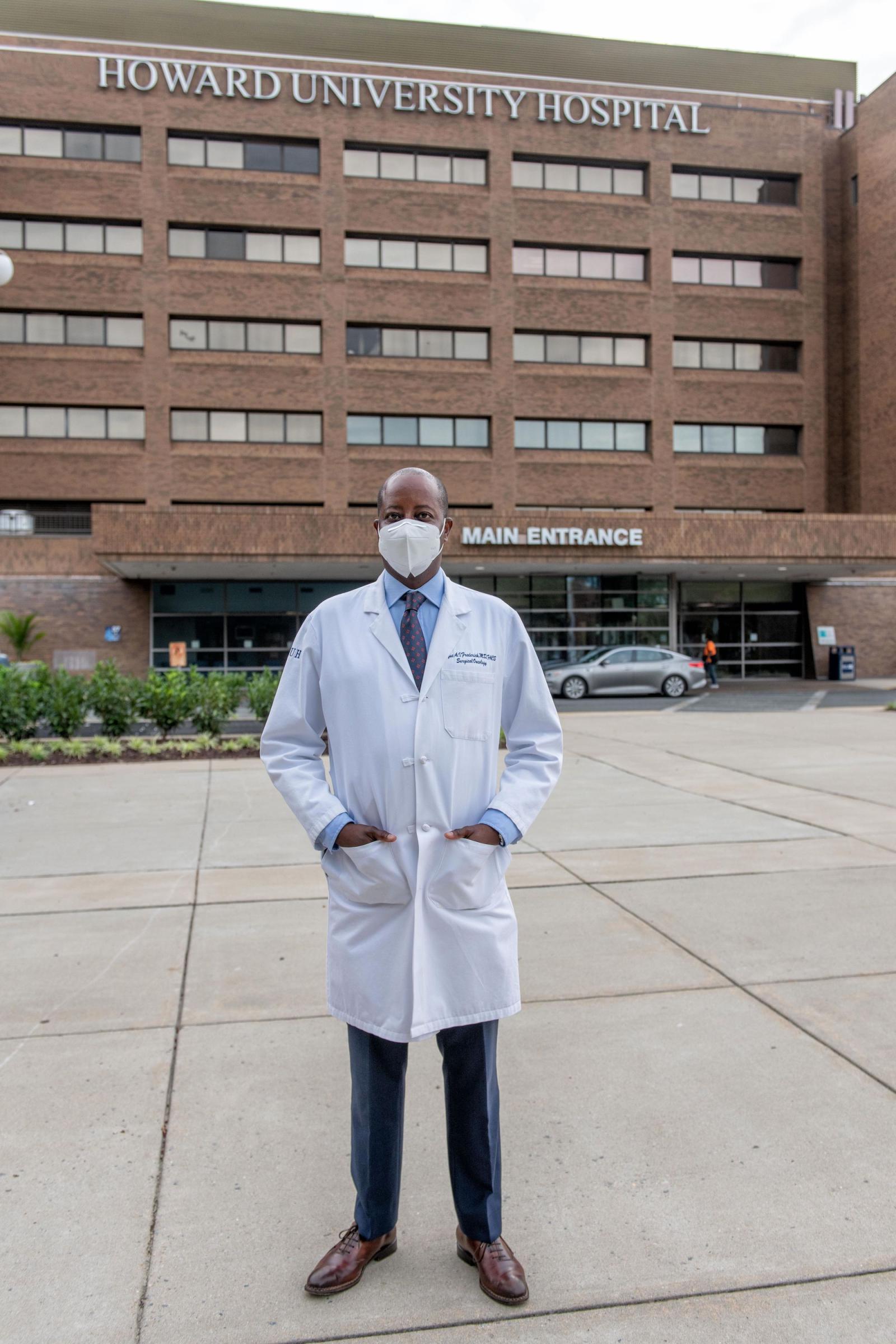 Dr. Frederick in front of Howard University Hospital