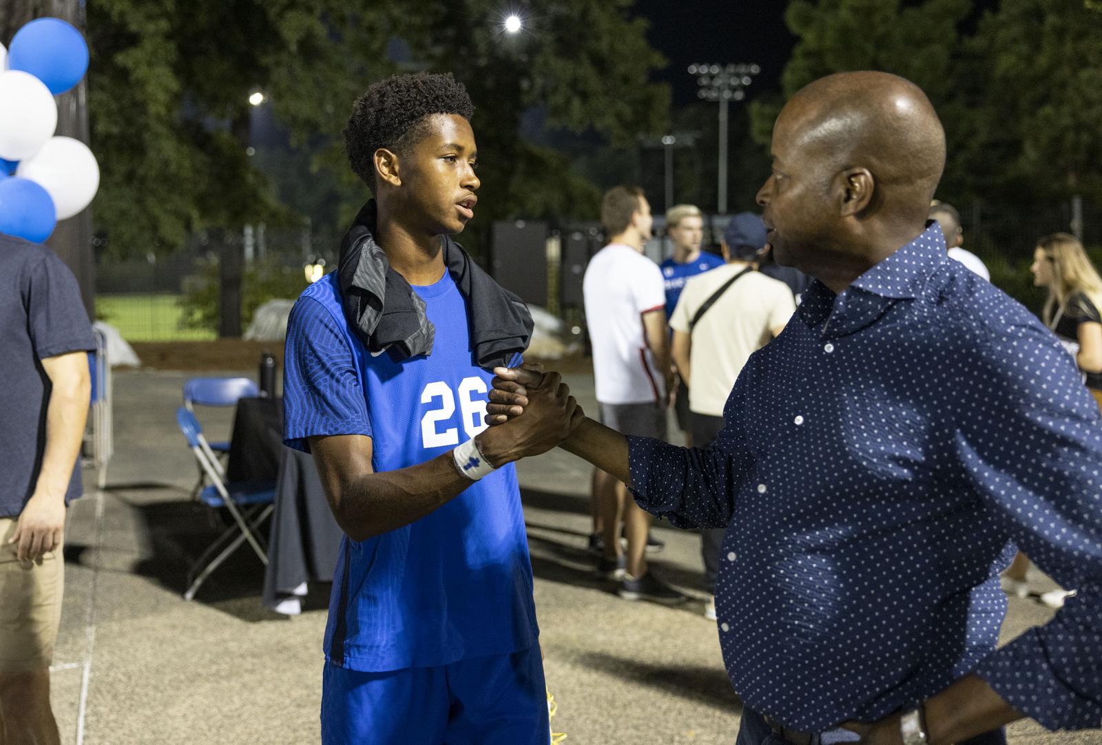 Dr. Frederick with son Wayne Jr. 