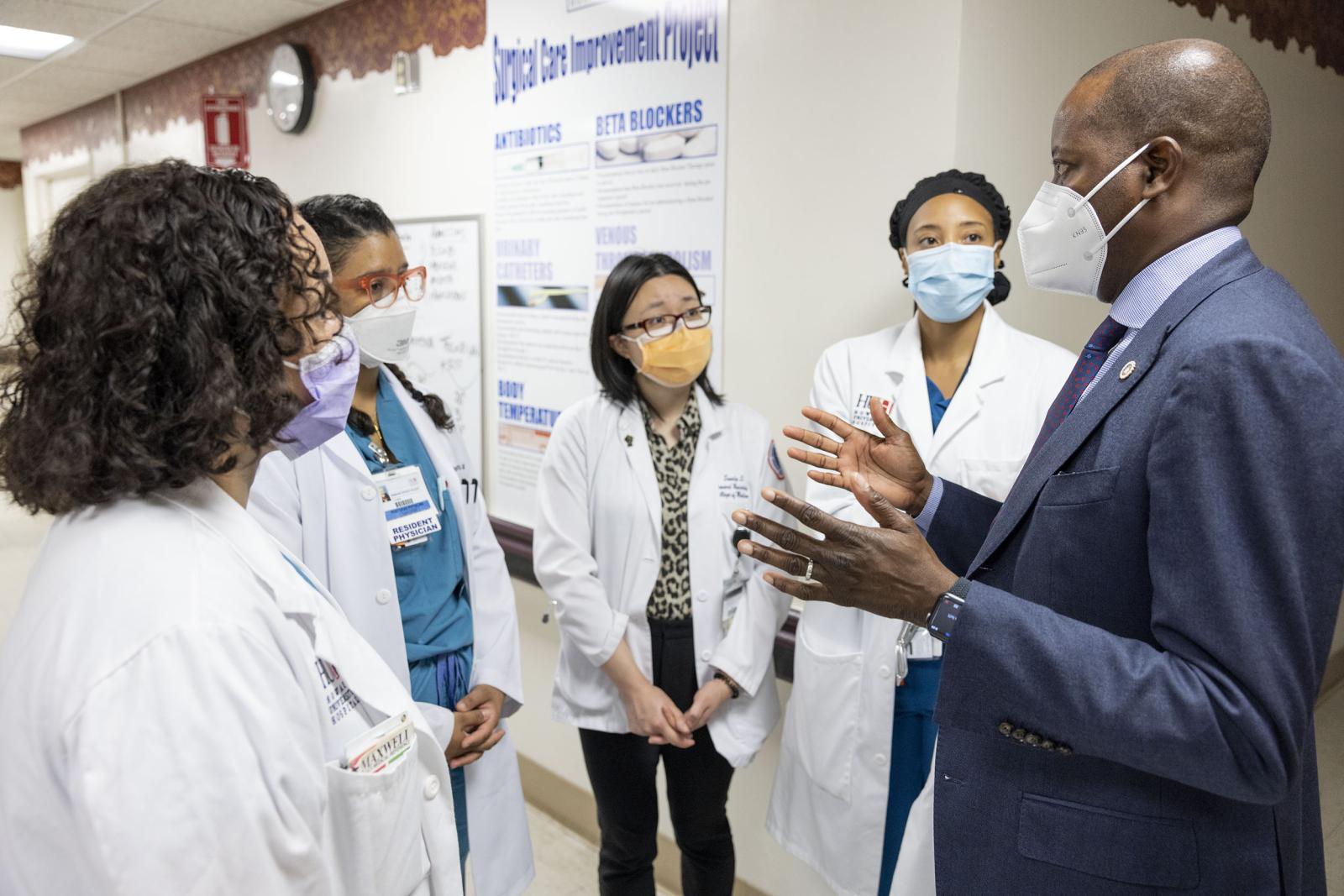 Dr. Frederick with group of medical students