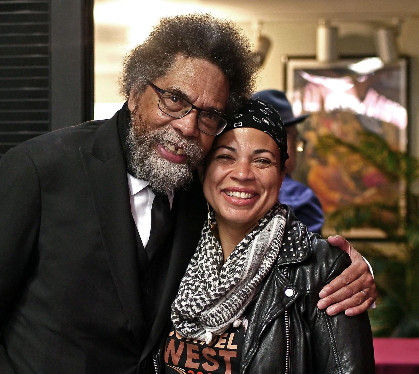 Cornel West and Medinah Abdullah, an alumna of Howard University.