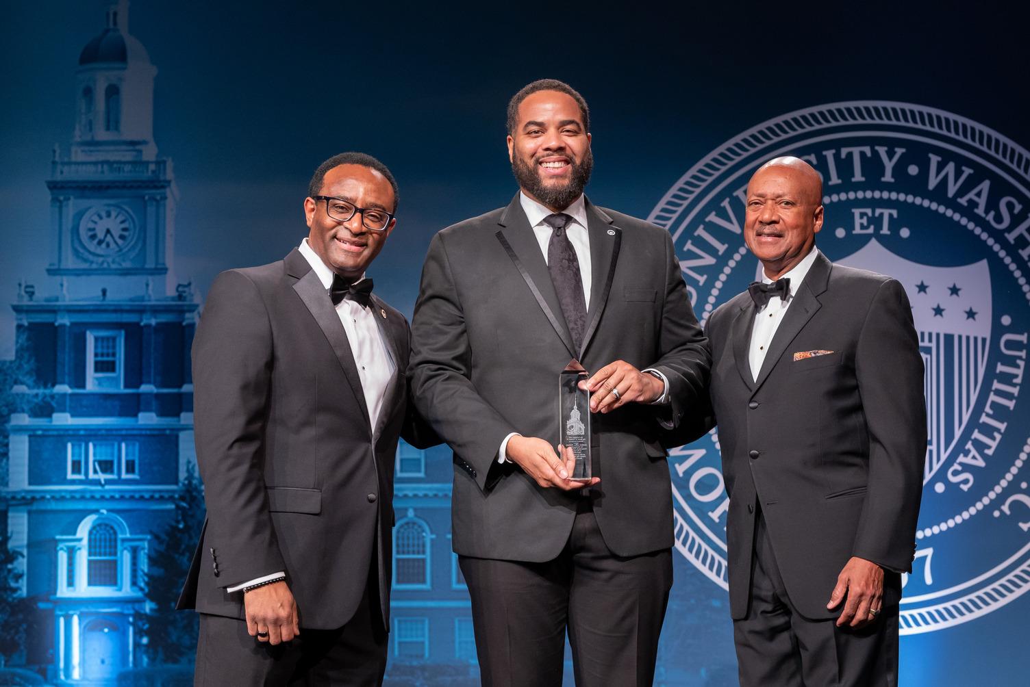 Three-time graduate and Detroit native Andrae Townesl accepts his award for the 2024 Alumni Achievement Award. (Source: Howard University)